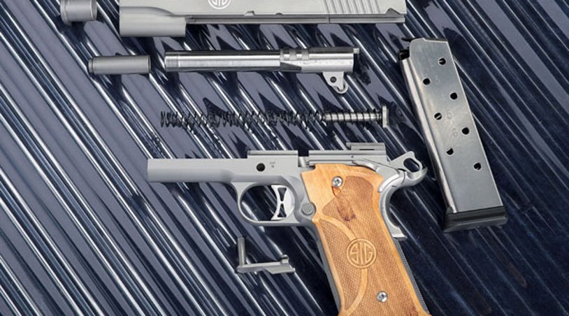 The dismantled SIG Sauer 1911 Stainless Super Target pistol