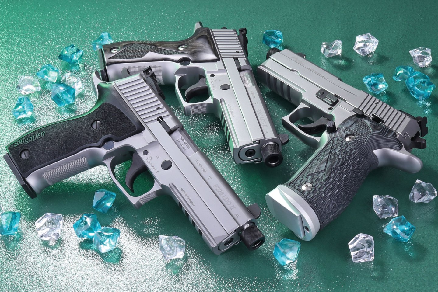 SIG Sauer P226 LDC II in three versions (from left to right): the "Mastershop", the "Target Mastershop" and the "Super Target Mastershop". 