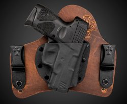 Taurus adds the compact G3c to its 9mm G3 pistol series Taurus G3c 9mm pistol inside the holster