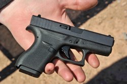 Semiautomatic pistol... Plastic or metal? Semiautomatic pistol... Plastic or metal?