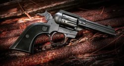A cowboy-style revolver with interchangeable 9-shot cylinder: from Diamondback Firearms, the new Sidekick The Sidekick has smooth black Cerakote finish
