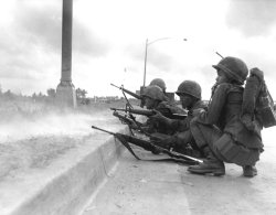 The US Army cancels the Interim Combat Service Rifle program Soldier in Vietnam War era with M16 rifle.