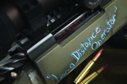 Remington 40-X Long Distance Operator rifle, long-range shooting with accuracy and style The lettering on the stock of the Remington 40-X Long Distance Operator rifle