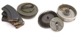 "Feeding the beast": high-capacity magazines for automatic weapons A technical overview on the history and type of high-capacity magazine feeding systems for select-fire and full-automatic firearms