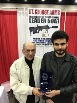 The Leader 50 A1 long-range rifle wins the 2016 Blue Book of Gun Values award Charles and Arran St.George at the 2016 NRA Annual Meetings and Exhibits