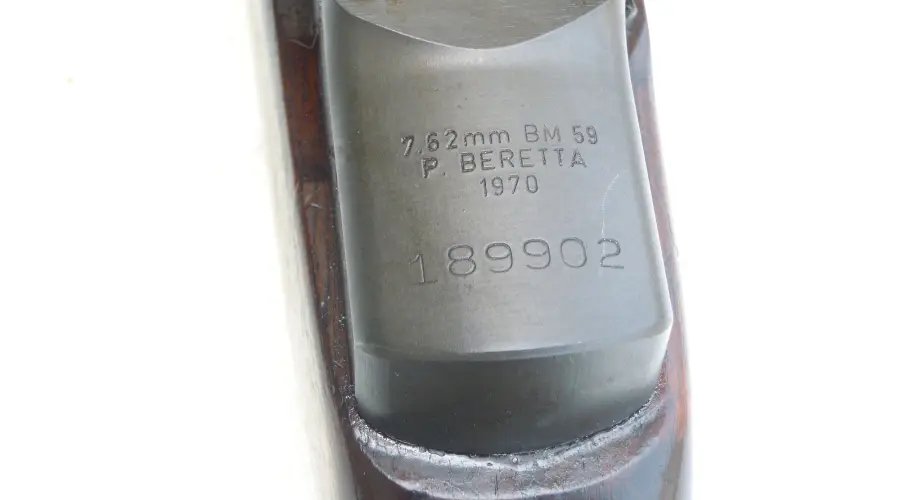 Factory markings on the receiver of a Beretta BM59 rifle