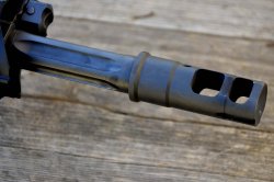POF 415: a short stroke piston AR15-style rifle The compensator/muzzle brake of the POF 415