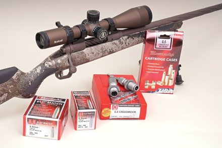 Savage 110 High Country in 6.5mm Creedmoor Savage 110 High Country with riflescope and various reload components.