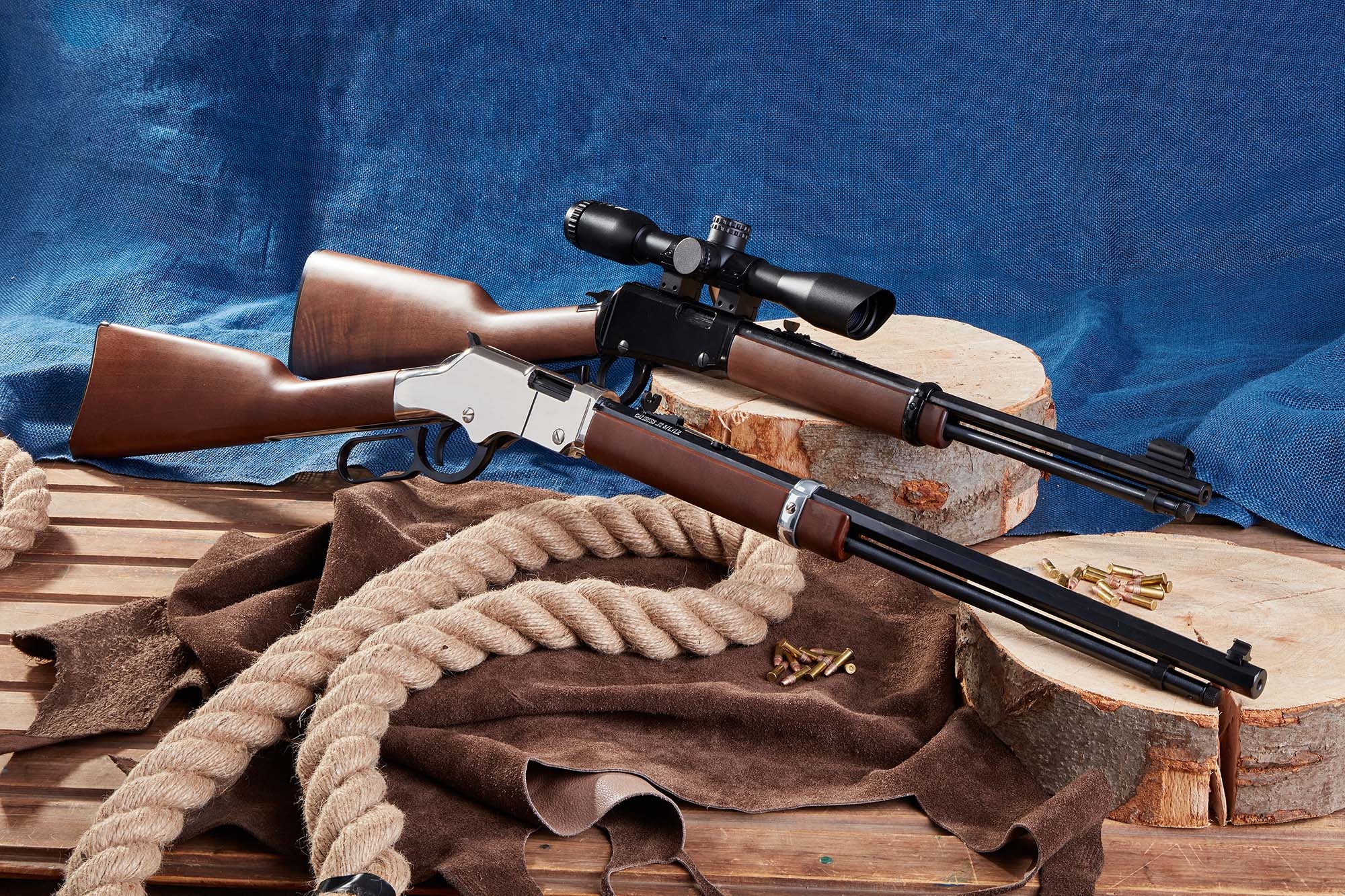 henry : Two different lever-action rifles from Henry Repeating Arms: Golden Boy Silver Rifle and Carbine lever-action rifles in .22 Long Rifle