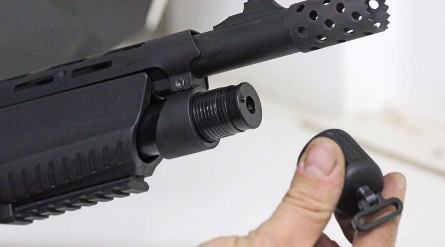 Unscrewing the magazine cap of the Armsan RS-X1 tactical shotgun in 12 gauge magnum