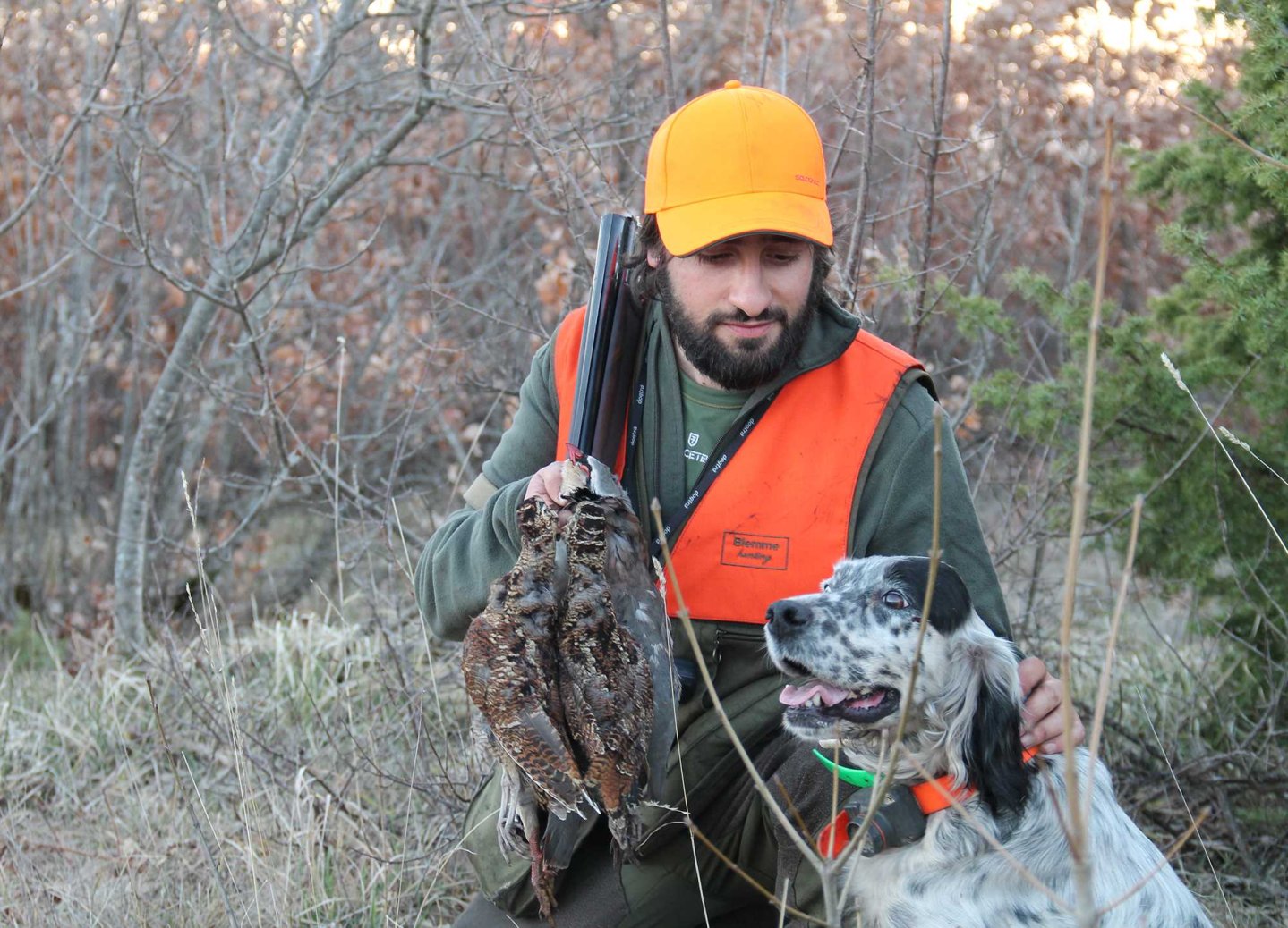 Cacciatore con cane e beccaccia