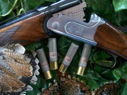 Rizzini Omnium Small Action calibro 28 Dettaglio sovrapposto Rizzini con quattro cartucce calibro 28