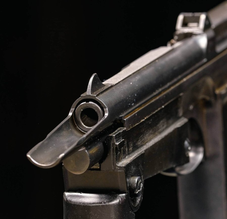 La pistola mitragliatrice PM-63 Rak calibro 9x18 Makarov Appendice a cucchiaio della PM-63 Rak calibro 9x18 Makarov