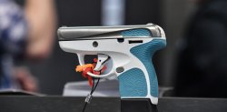 Pistola da difesa Taurus Spectrum Pistola Taurus Spectrum con inserti blu