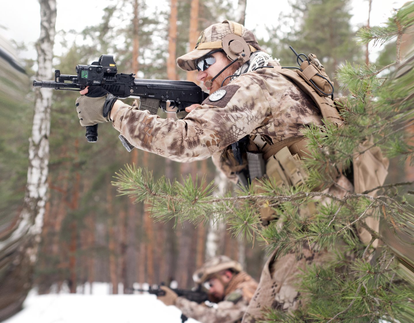 Охотник в одежде Kryptek