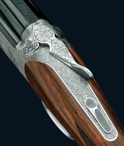 Caesar Guerini Ellipse Evo с вертикальными стволами Отпирание вертикалки Caesar Guerini Ellipse Evo осуществляется мягко, благодаря подпружиненным, при помощи спиральных пружин, бойкам и безкурковой конфигурации ударно-спускового механизма